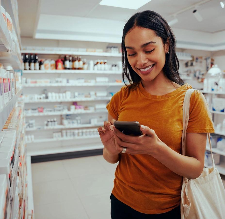 Woman looking for medication in a pharmacy