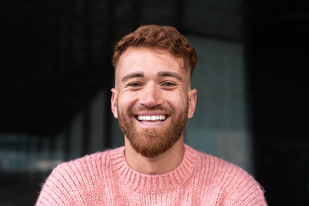 Happy man wearing a jumper