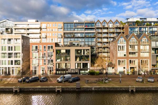 Wohnen in den Houthavens: Nachhaltig und modern am IJ