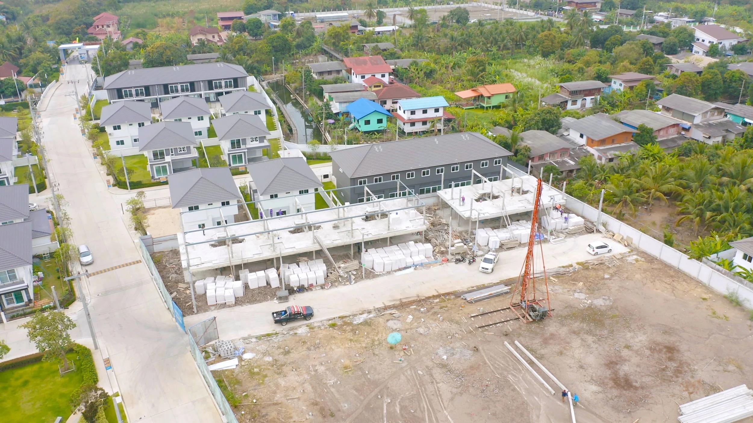 Aerial view of new houses being built in a housing estate