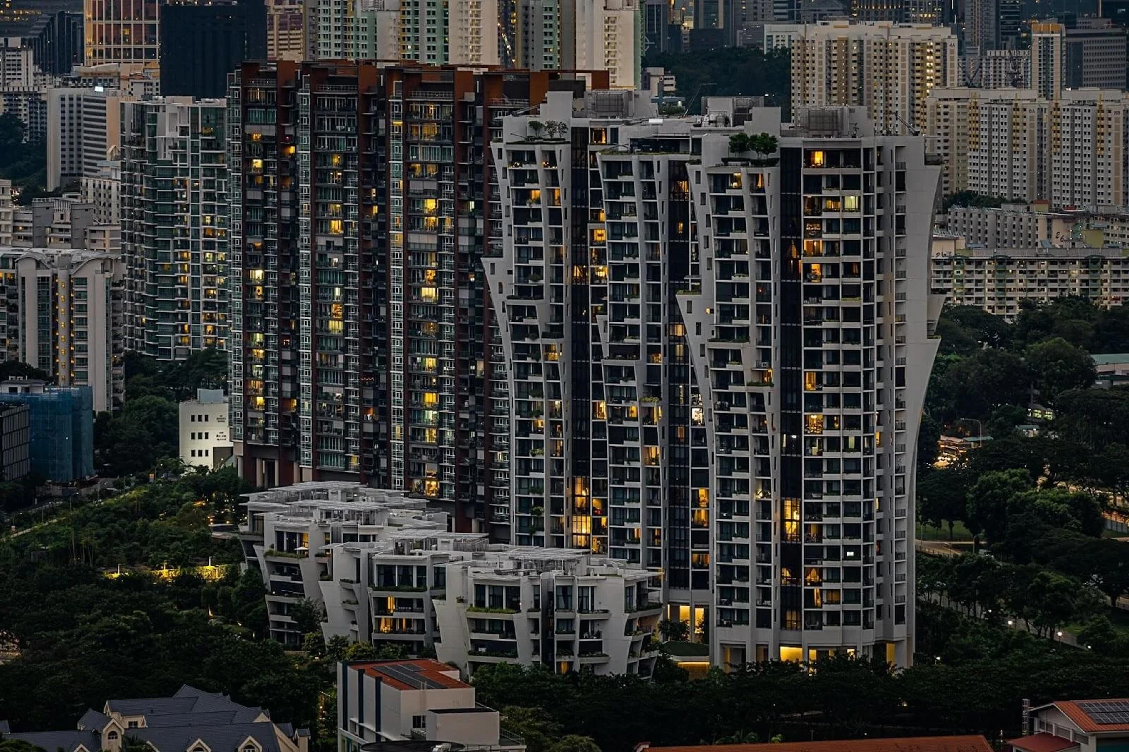 Private condominium towers in Singapore at dusk