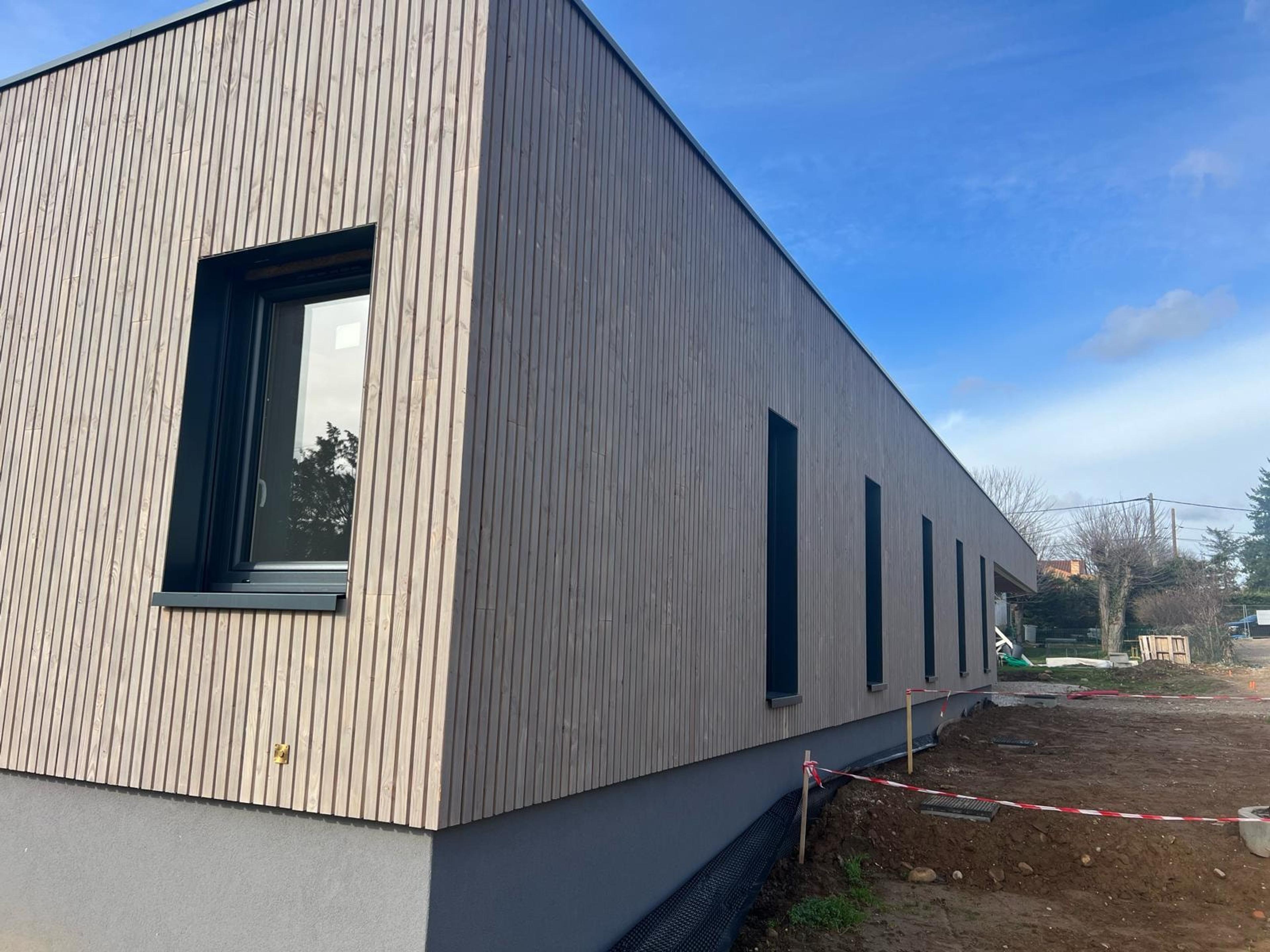 Maison à ossature bois de 130 m², Massieux (01) : photo 1 sur 5
