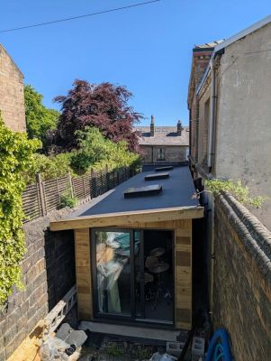 Rearview of the project with focus on the studio space.