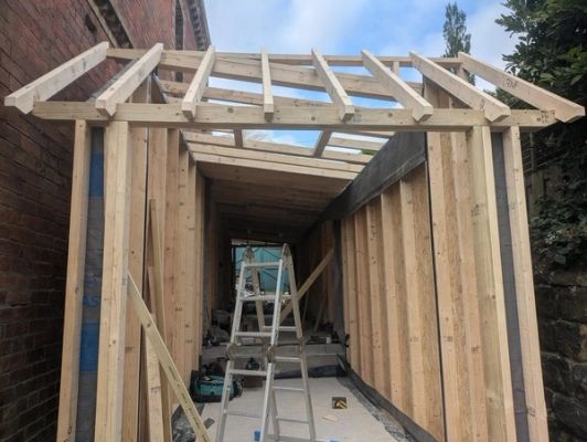 Under construction view of the project and its framing