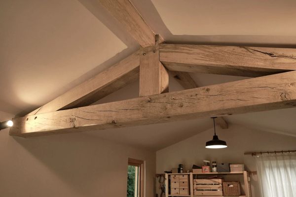 Timber roof truss within the cabin.