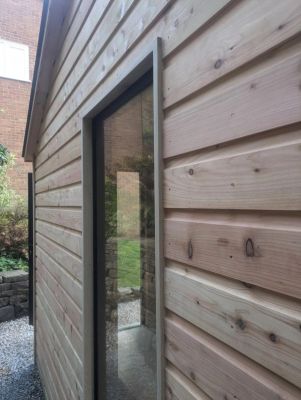 Side view of the project looking through the full height window.