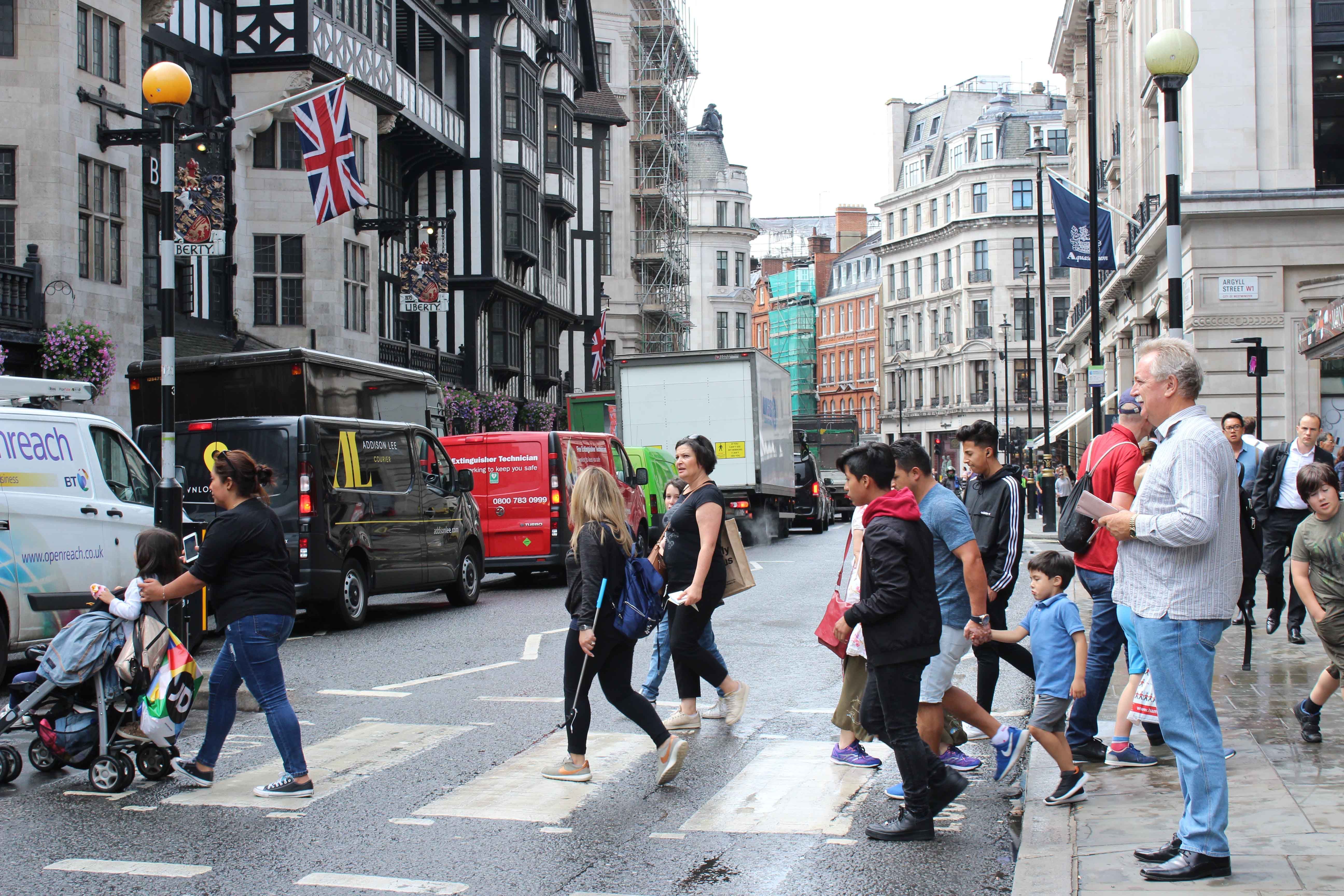 People crossing at a zebra crossing outside Liberty.