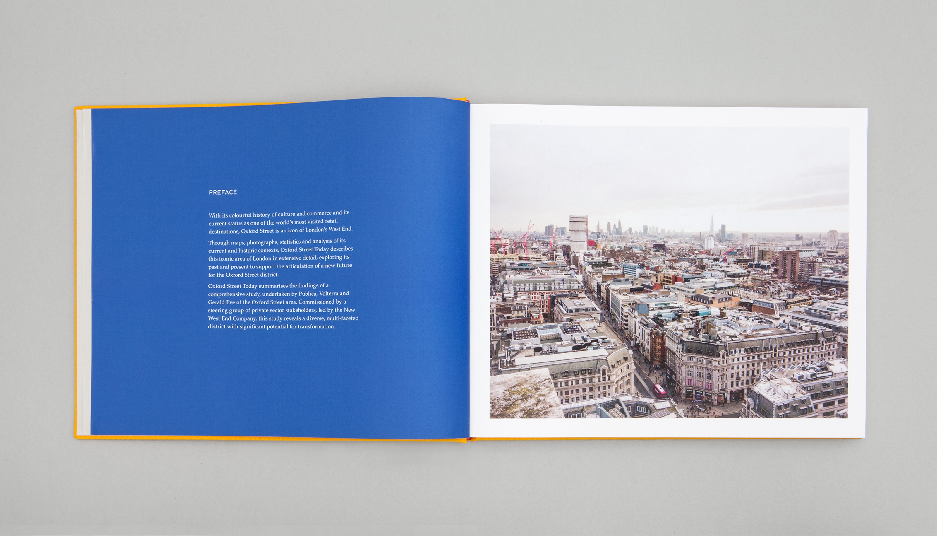 Flat lay photograph displaying the inside of a report titled "Oxford Street Today: The current context of the Oxford Street area."