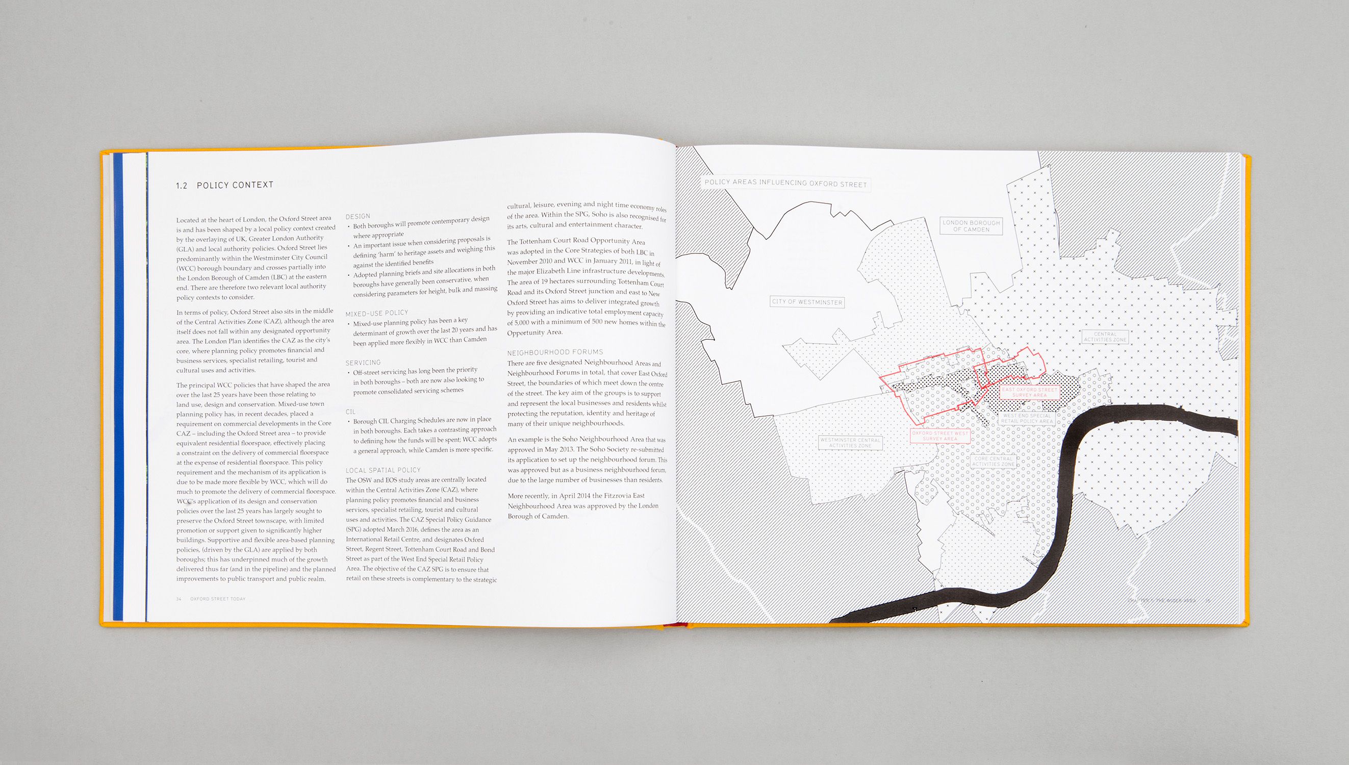 Flat lay photograph displaying the inside of a report titled "Oxford Street Today: The current context of the Oxford Street area."