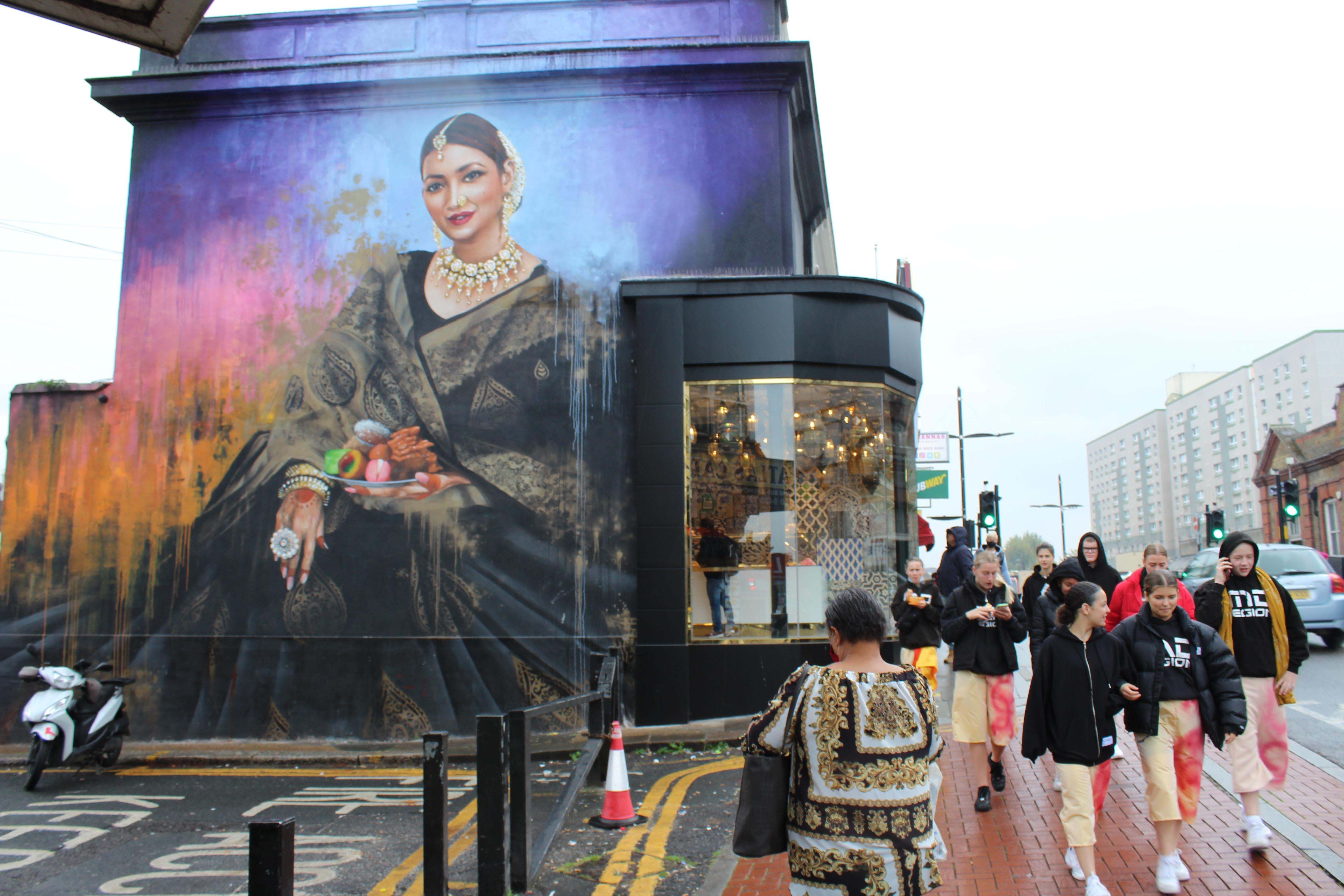A large colourful mural on Green Street. 