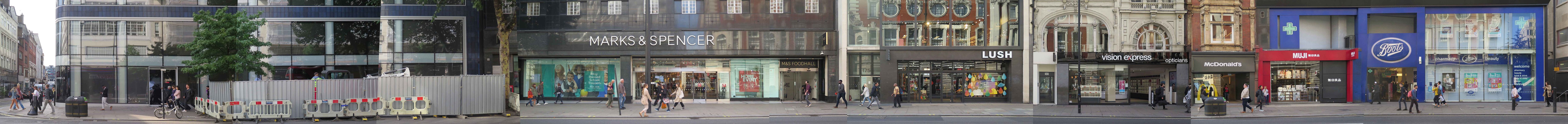 Panoramic photo of a strip of oxford street with a number of shops