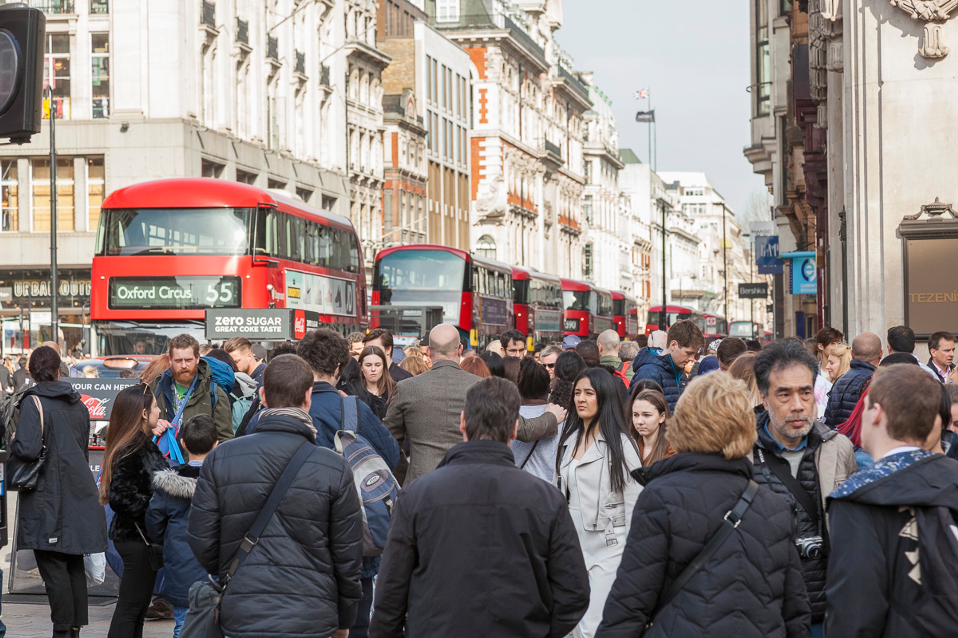 Crowded pavement on Oxford Street.