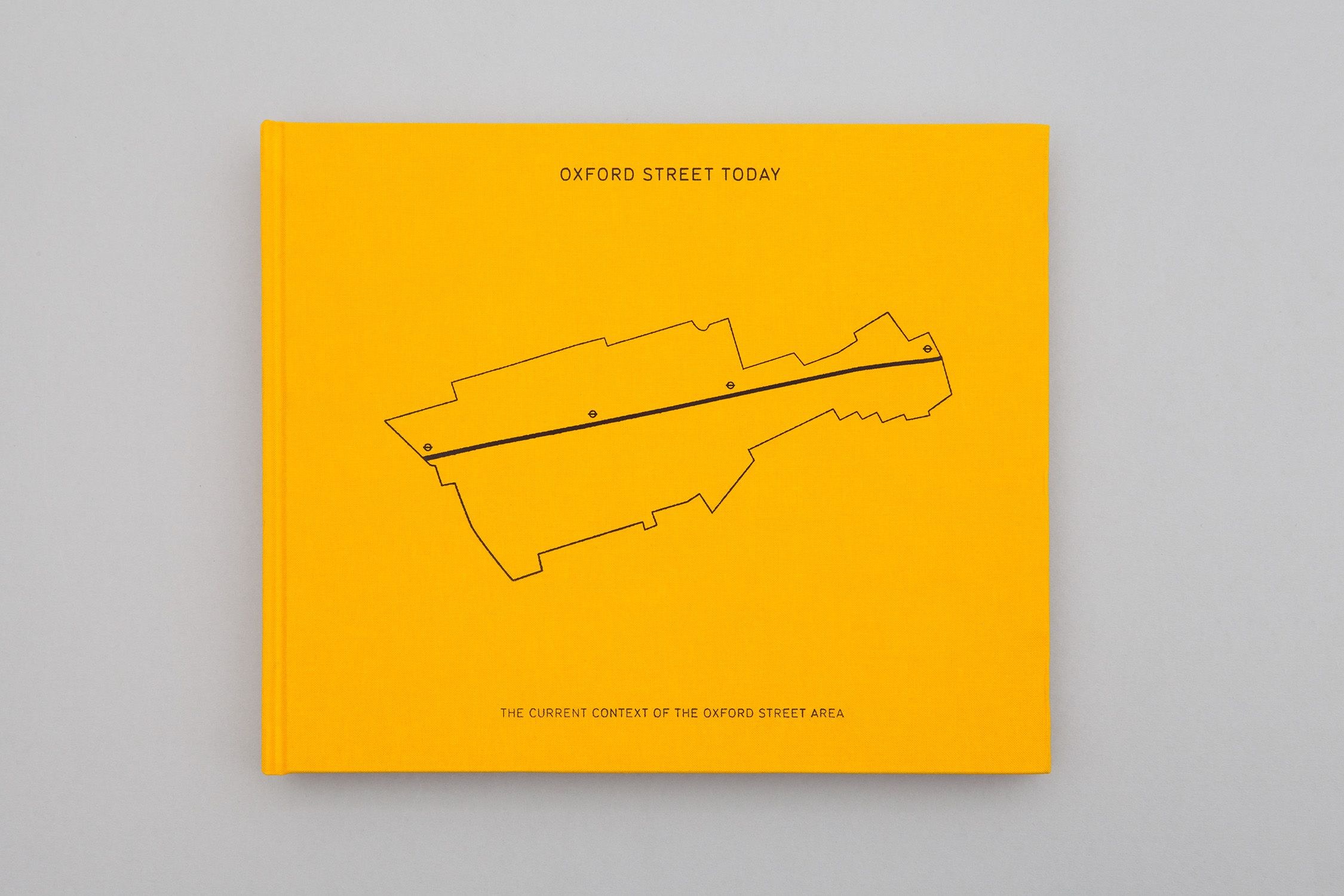 Flat lay photograph displaying the cover of a report titled "Oxford Street Today: The current context of the Oxford Street area."