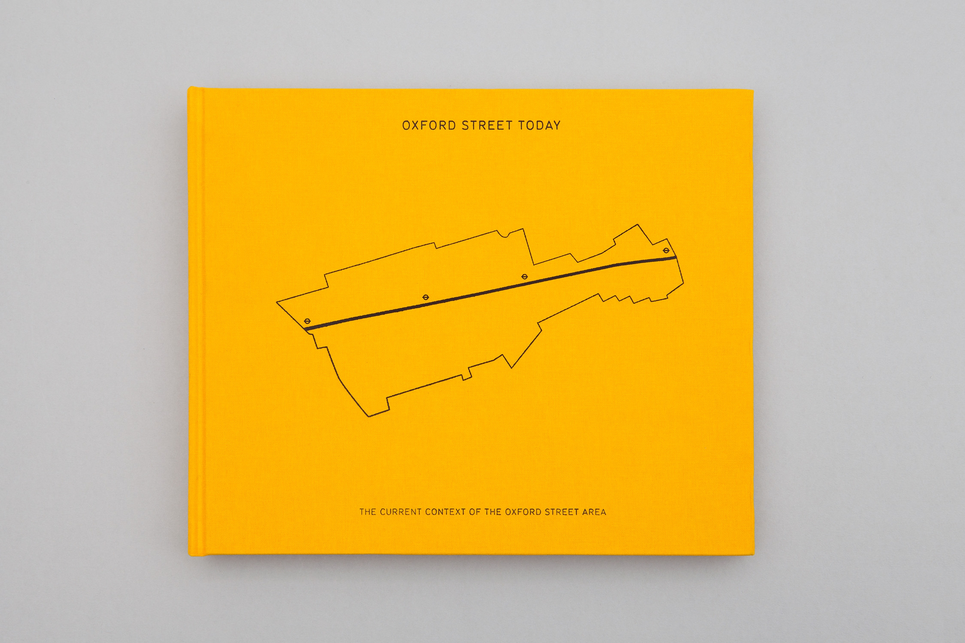 Flat lay photograph displaying the cover of a report titled "Oxford Street Today: The current context of the Oxford Street area."