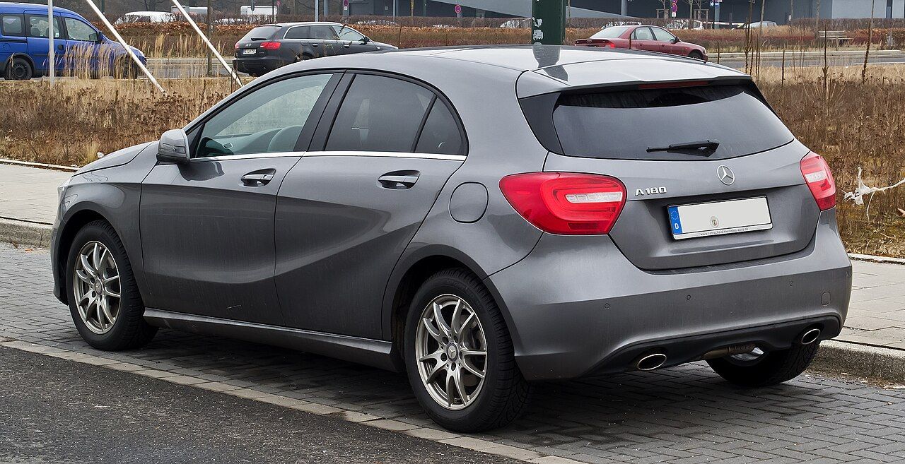 A modern Mercedes-Benz A180 (A-Class) parked outdoors. This premium hatchback uses the M282 engine, which is mechanically identical to the Renault 1.3 TCe.