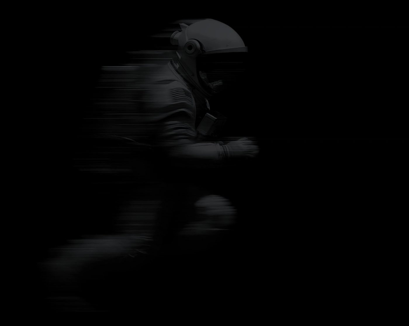A figure in a helmet, blurred mid-stride