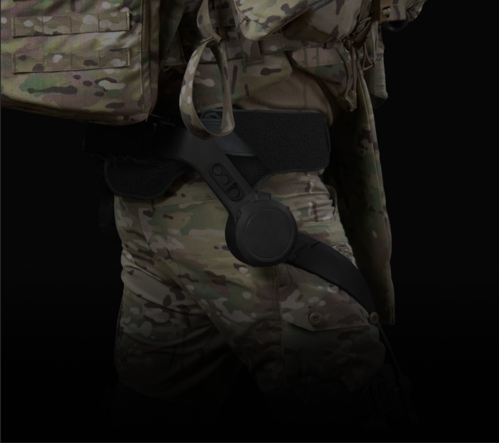 Powered actuators driving the leg of an Edgerun exoskeleton mid-stride