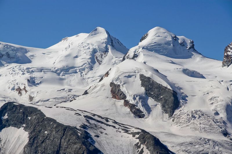 Castor i Pollux widziane od strony stacji Gornergrat
