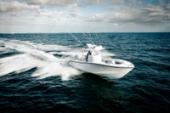 Yellowfin 32 Offshore bow and twin outboards seen from above while running