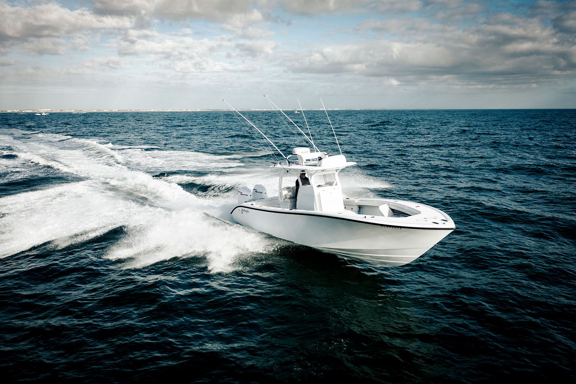 Yellowfin 32 Offshore bow and twin outboards seen from above while running