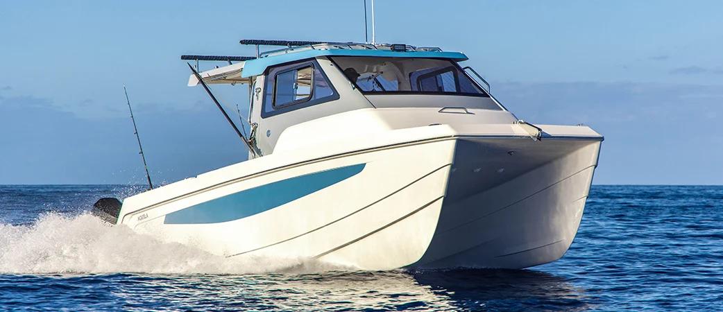 Aquila 28 Molokai Cuddy offshore power catamaran running at speed