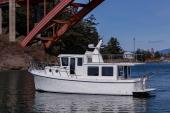 American Tug 362 passing under a bridge