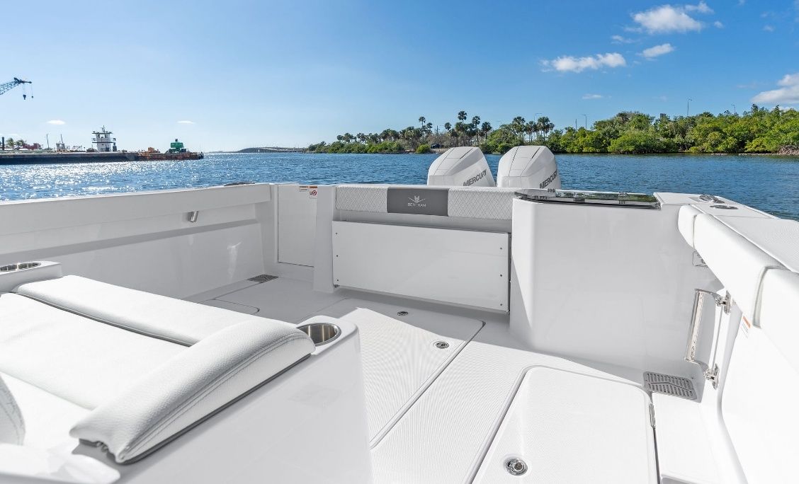 Bertram 34CC aft cockpit with mezzanine seating and outboards
