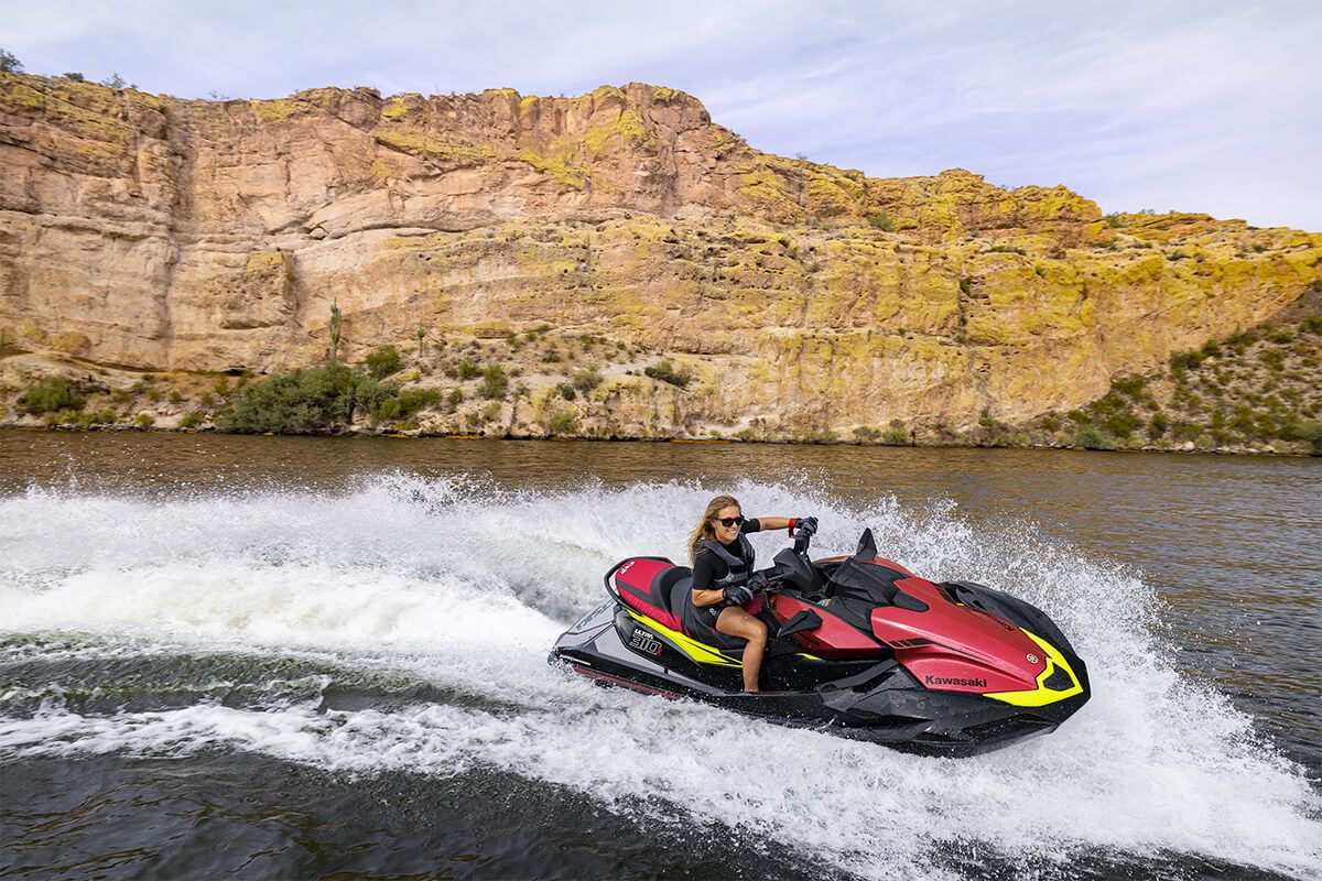 Kawasaki Ultra 310X 2025 jet ski, side angle of a rider on the water