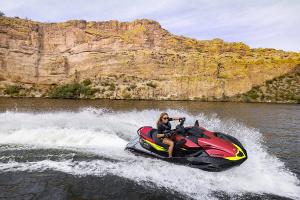 Kawasaki Ultra 310X 2025 jet ski, side angle of a rider on the water