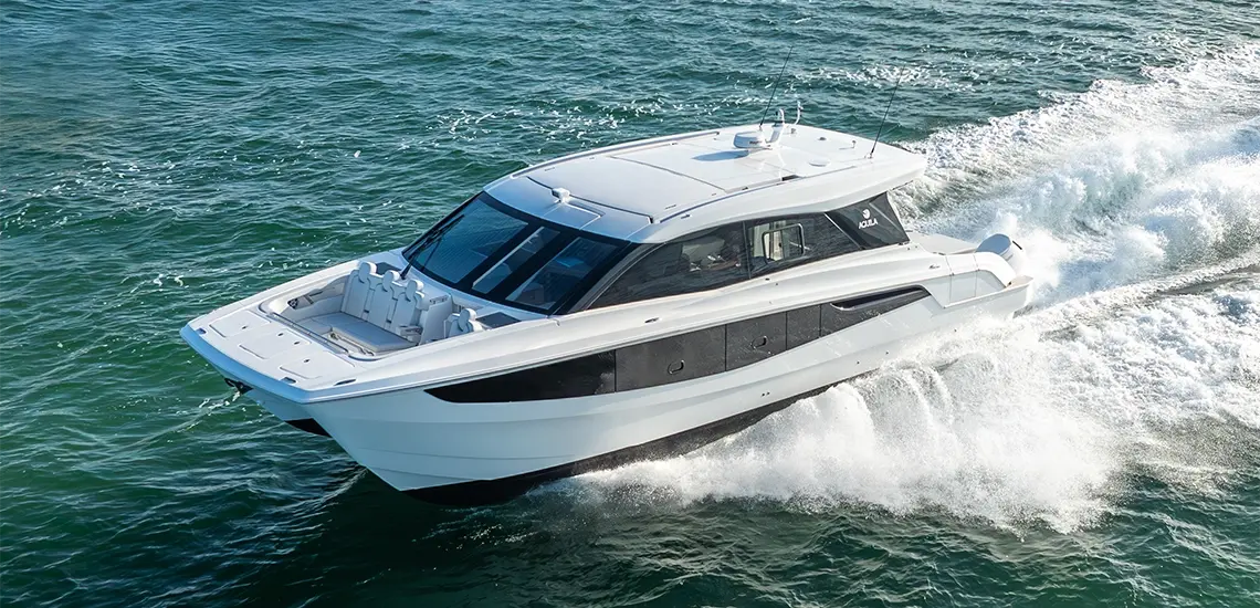 Aerial view of the Aquila 46 Coupe carving a wake at speed