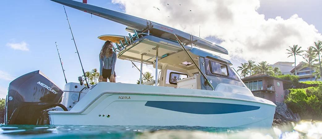 Aquila 28 Molokai Cuddy with extended hardtop and rod holders