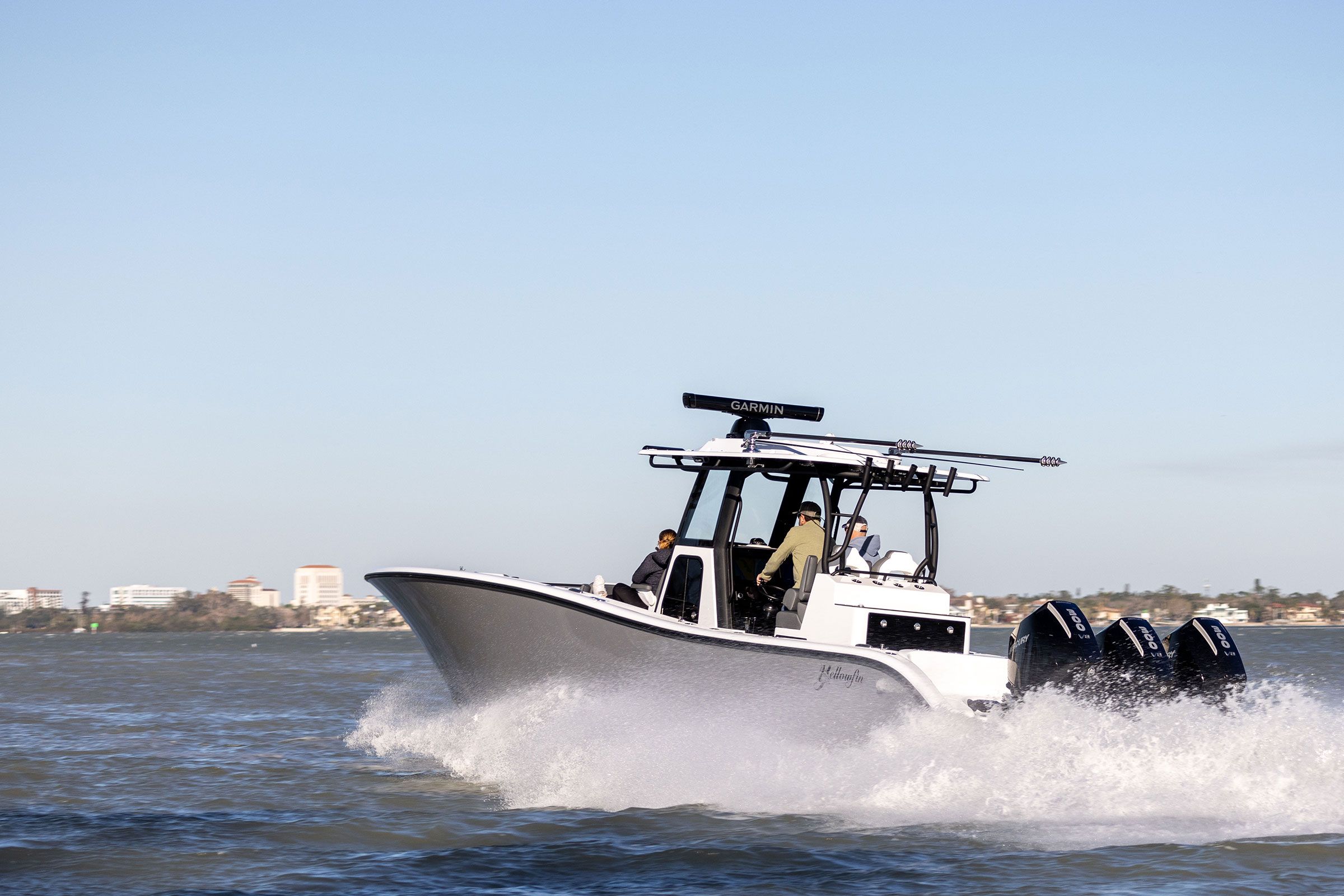 Yellowfin 36 Offshore running bow-on with spray at the hull