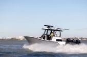 Yellowfin 36 Offshore running bow-on with spray at the hull