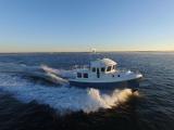 American Tug 435 running at speed in evening light