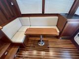 American Tug 362 dinette with teak and holly sole