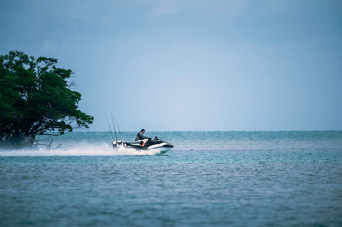 Kawasaki Jet Ski Ultra 160LX-S Angler in profile, riding into open water