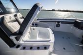 Open bow storage hatch beside the lounger seat on the Yellowfin 36 Offshore