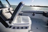 Open bow storage hatch beside the lounger seat on the Yellowfin 36 Offshore