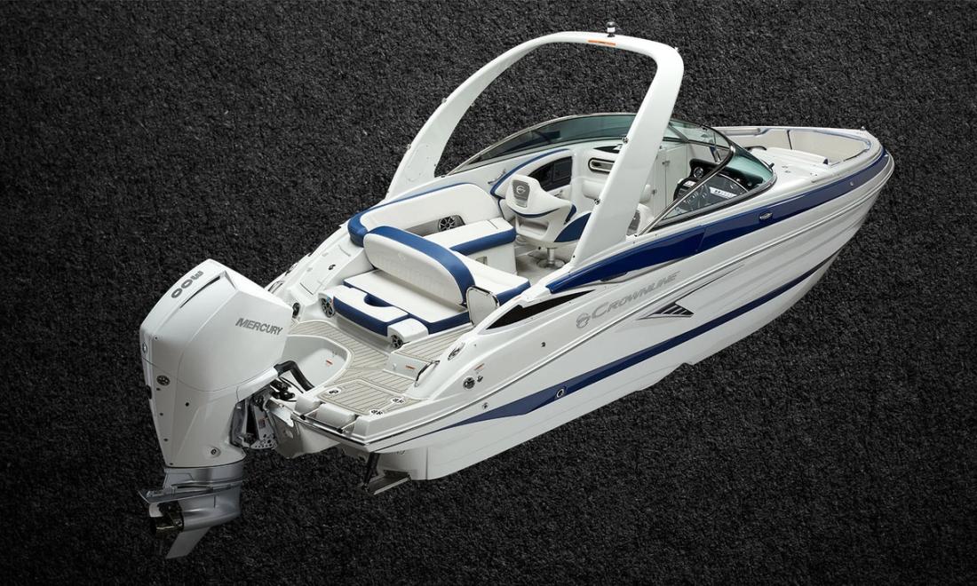 Crownline 260 XSS outboard bowrider with electric fold-down arch, stern-quarter studio view