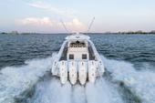 Stern of the Yellowfin 54 Offshore with four outboards running at speed
