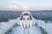 Stern of the Yellowfin 54 Offshore with four outboards running at speed