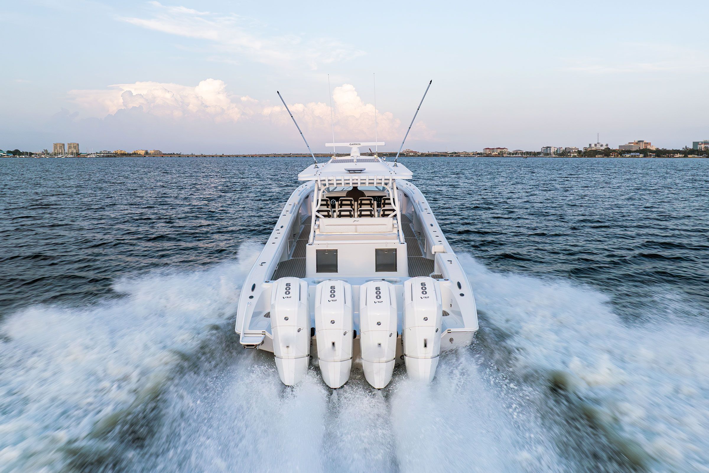 Stern of the Yellowfin 54 Offshore with four outboards running at speed