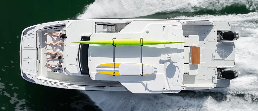 Aquila 45 Sport at anchor with guests enjoying the deck
