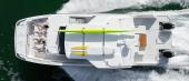 Aquila 45 Sport at anchor with guests enjoying the deck