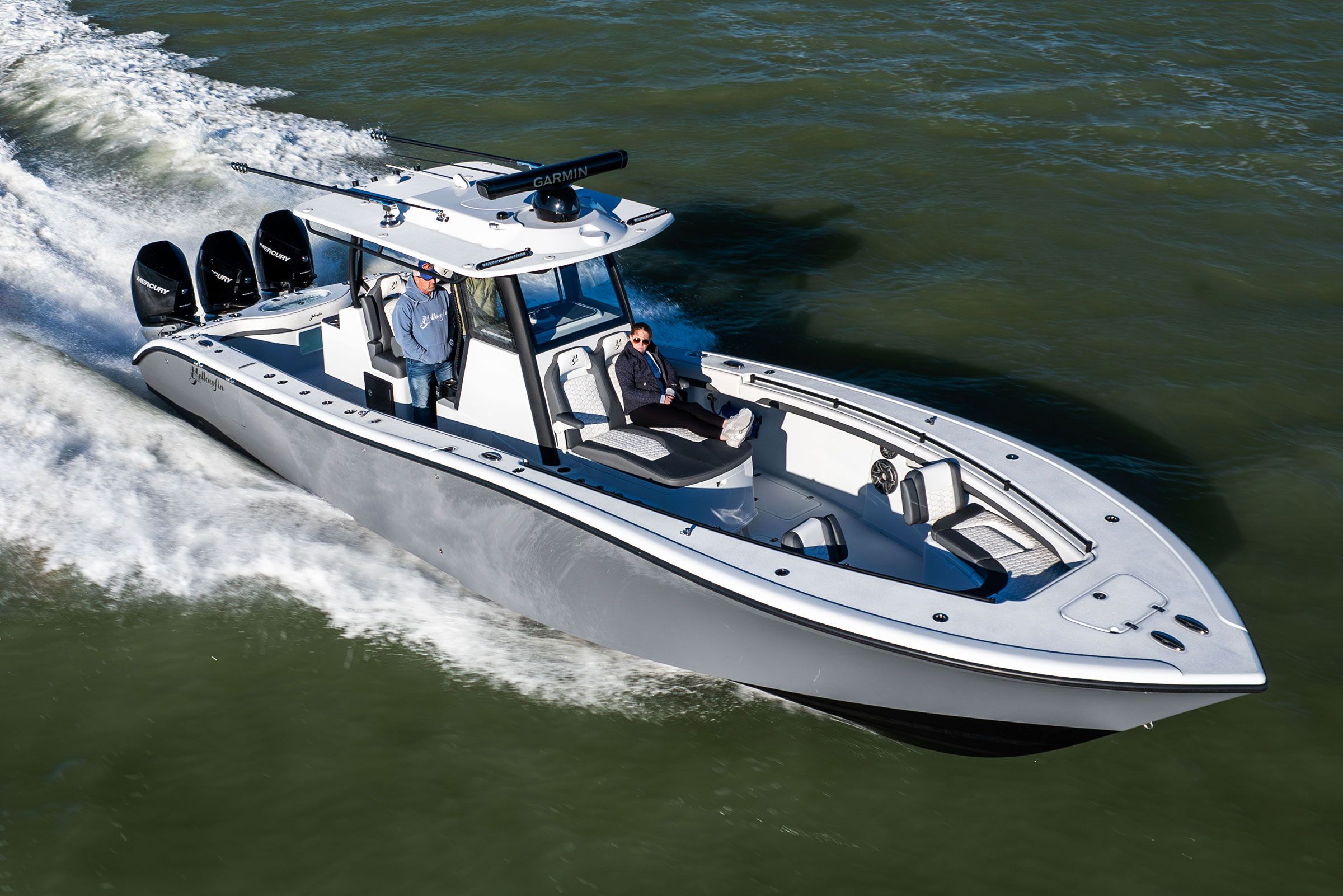 Aerial view of the Yellowfin 36 Offshore running with triple outboards and a hardtop