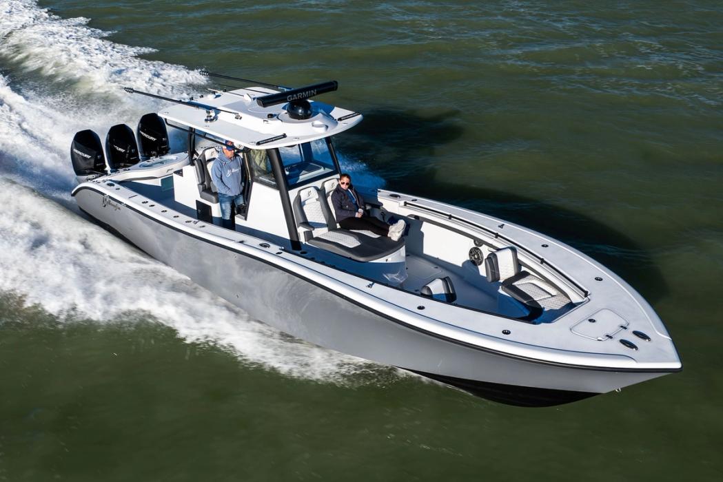 Aerial view of the Yellowfin 36 Offshore running with triple outboards and a hardtop