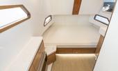 Bertram 39CC console cabin with berth and wood accents
