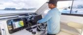Aquila 28 Molokai Cuddy protected helm station with multifunction display