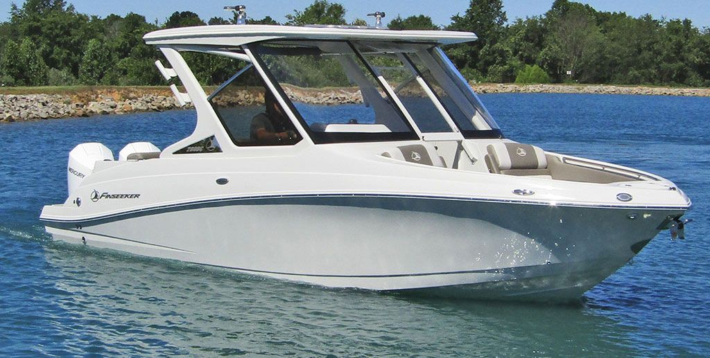 Crownline Finseeker 280 DC dual console with twin outboards under way