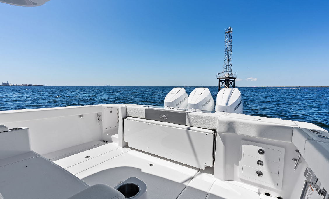 Bertram 39CC fishing cockpit with transom seating and rod holders